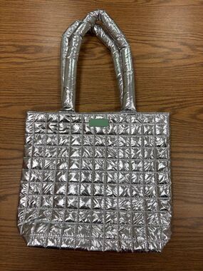 Silver Clinique quilted puff tote bag